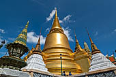 Bangkok Grand Palace,  Phra Si Rattana Chedi of the Wat Phra Keow (temple of the Emerald Buddha), with two  subsidiary chedi alongside the large golden one. 